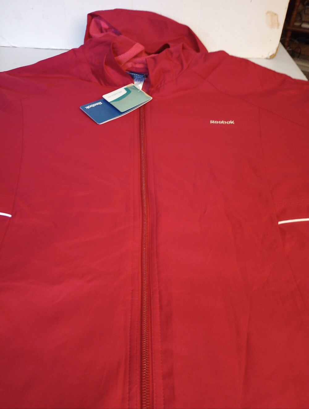 Reebok Women bright Red Hooded Windbreaker Pompous Jacket Size X-large